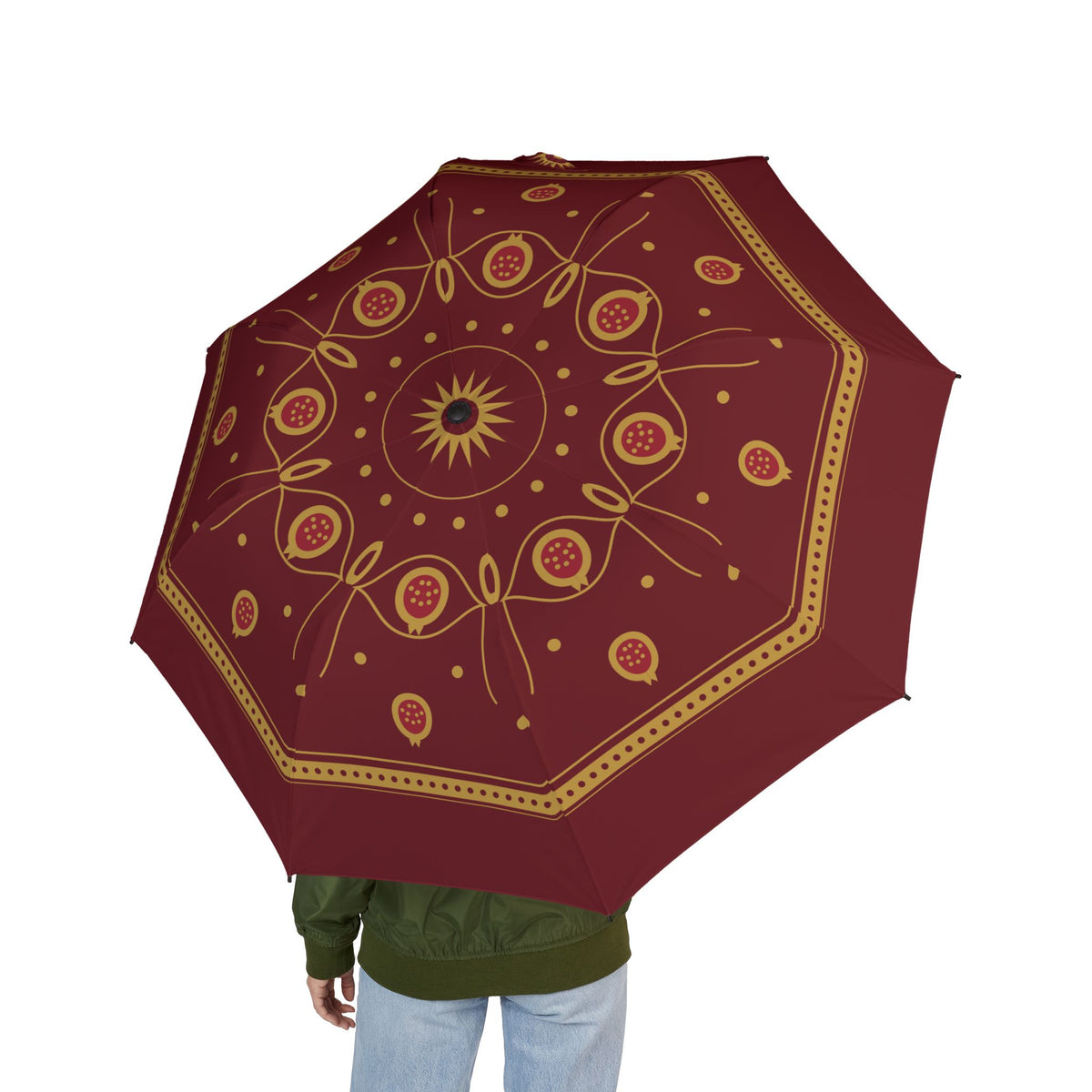 Person holding the Ruspoli pomegranate brocade folding umbrella, seen from behind