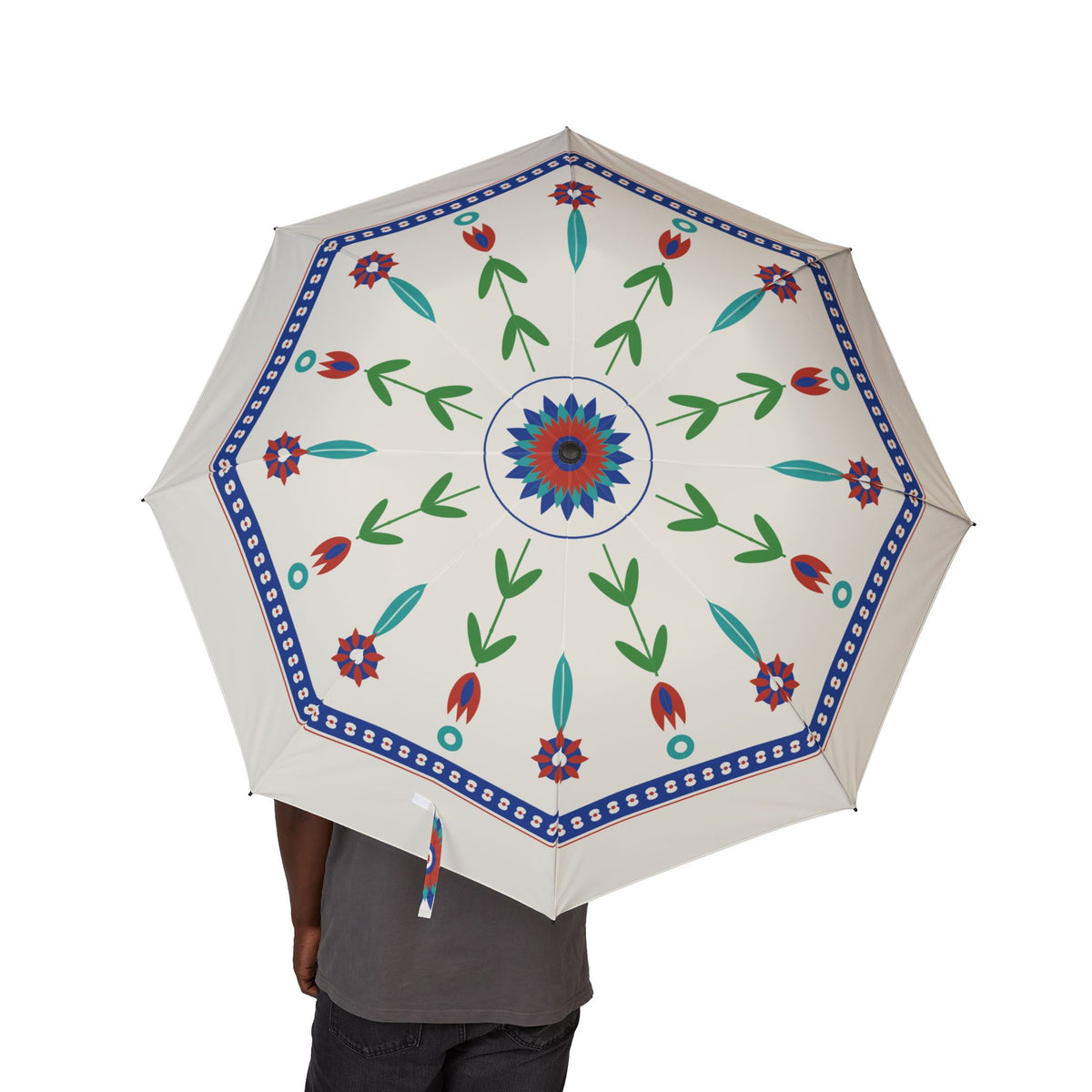 Person holding the Osman Iznik tulip folding umbrella, canopy from above
