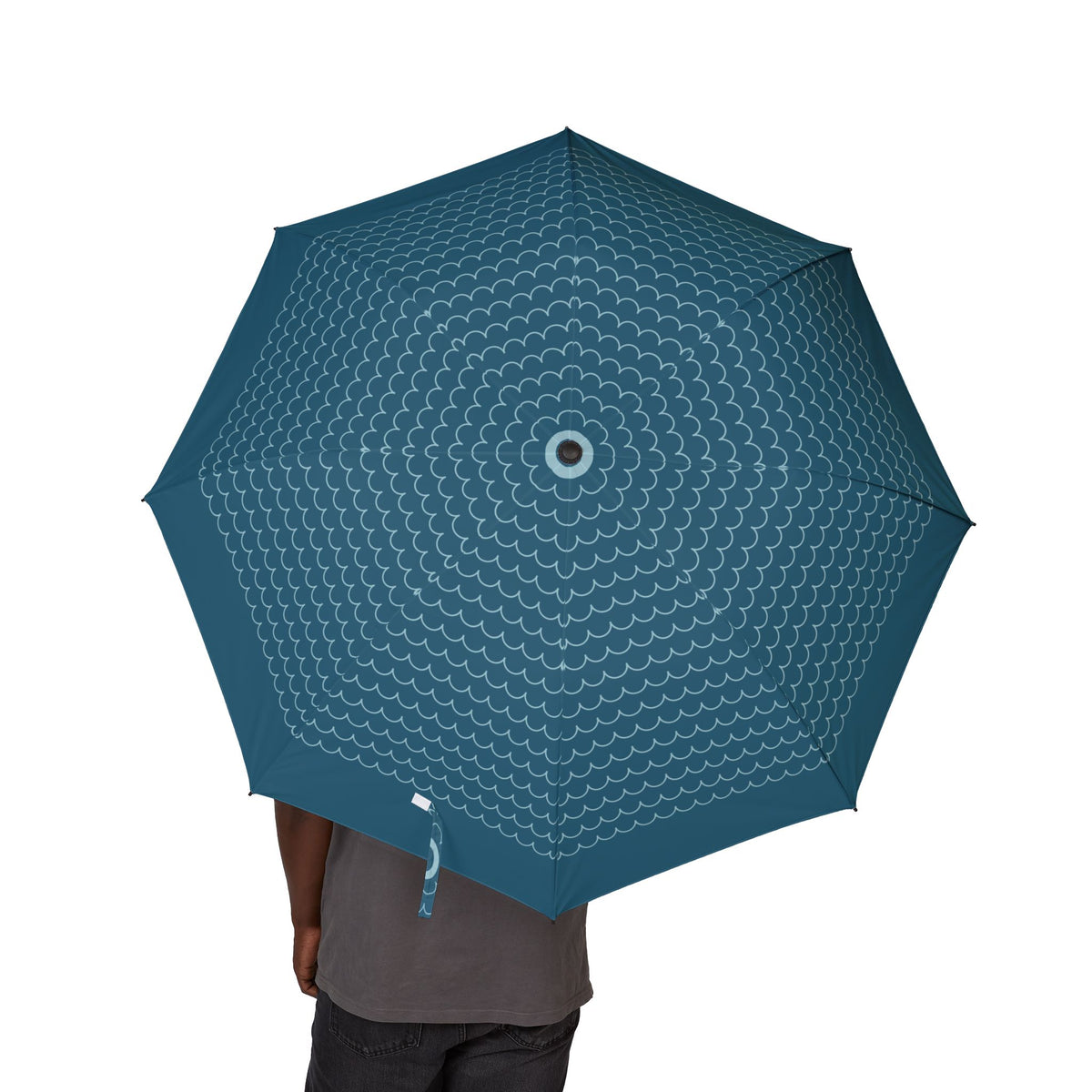 Person holding the Doria scallop folding umbrella, canopy from above