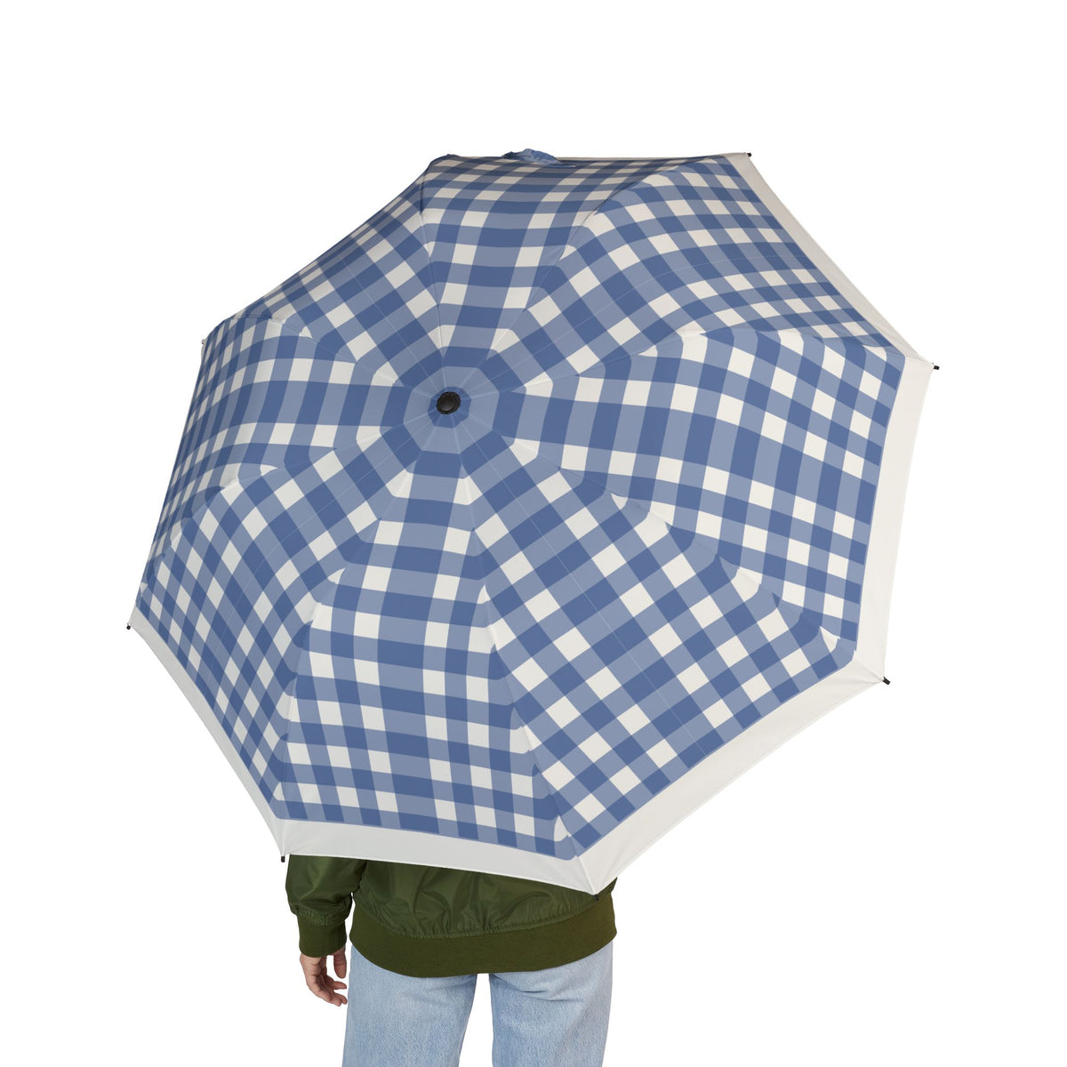 Person holding the Hanover navy gingham folding umbrella, seen from behind