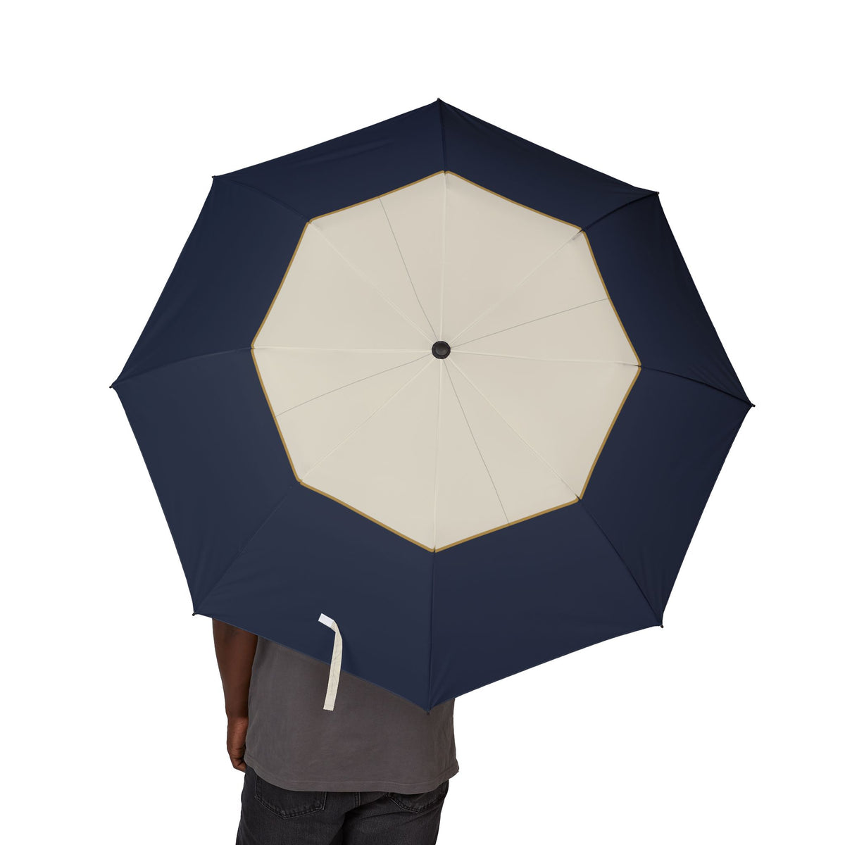 Person holding the Gordon octagon block folding umbrella, canopy from above