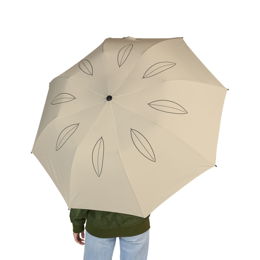 Person holding the Montagu single leaf folding umbrella, seen from behind