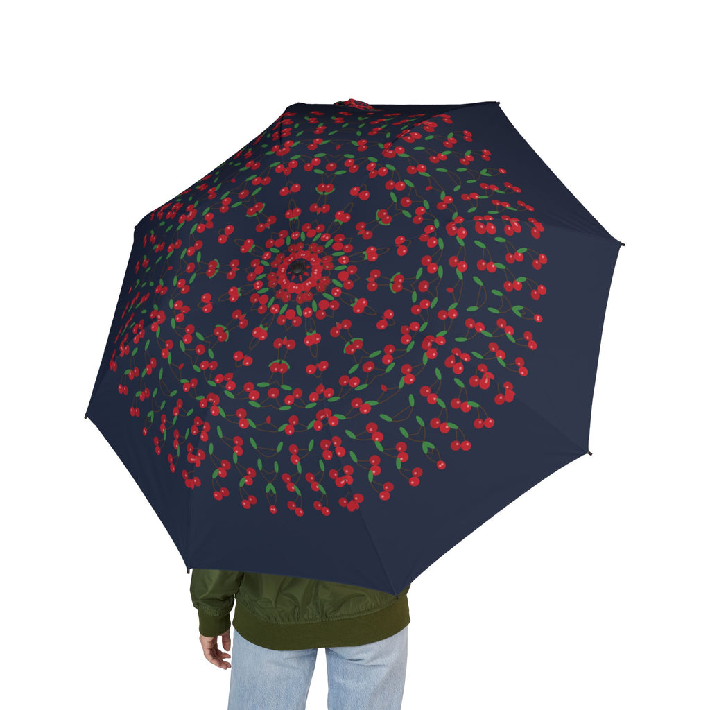 Person holding the Kinsky cherry folding umbrella, seen from behind