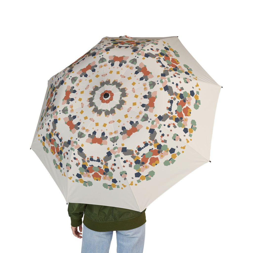 Person holding the Medinaceli terrazzo folding umbrella, seen from behind