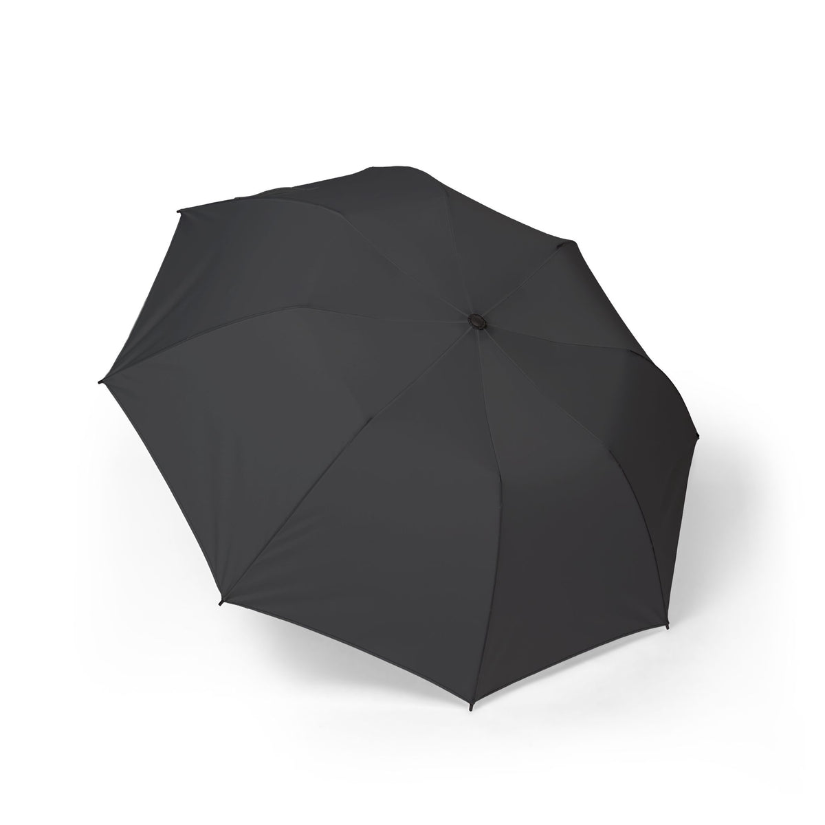 The Beaufort solid charcoal folding umbrella, open, seen from above