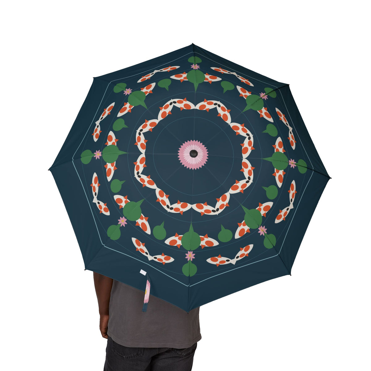 Person holding the Holstein koi pond folding umbrella, canopy from above