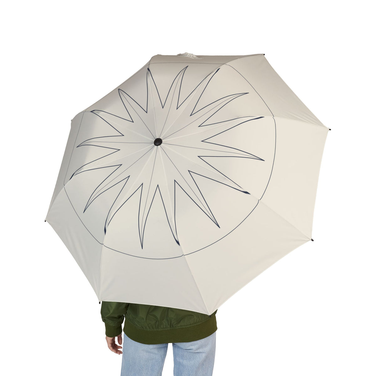 Person holding the Courtauld compass line folding umbrella, seen from behind