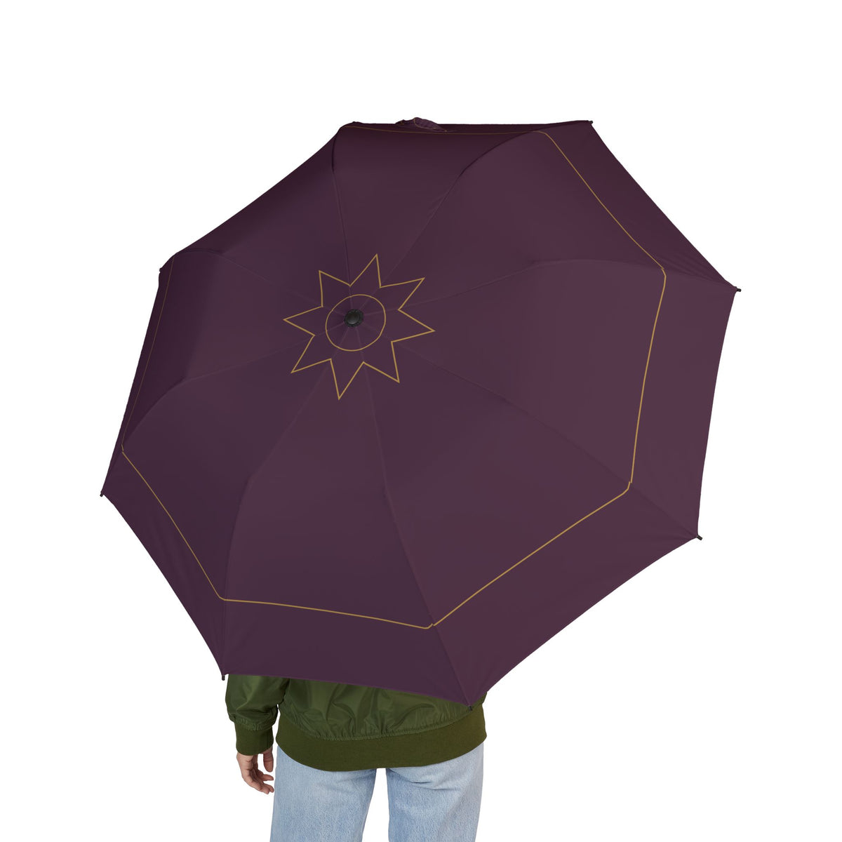 Person holding the Neville plum gold-rosette folding umbrella, seen from behind