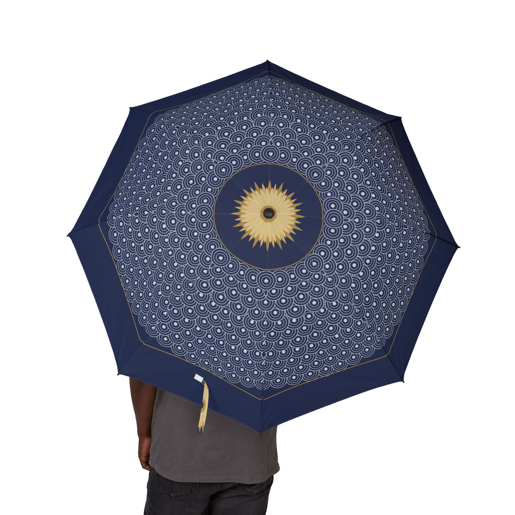 Person holding the Wittelsbach indigo wave folding umbrella, canopy from above
