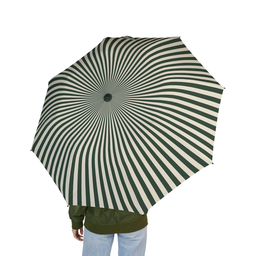 Person holding the Lancaster sunray stripe folding umbrella, seen from behind