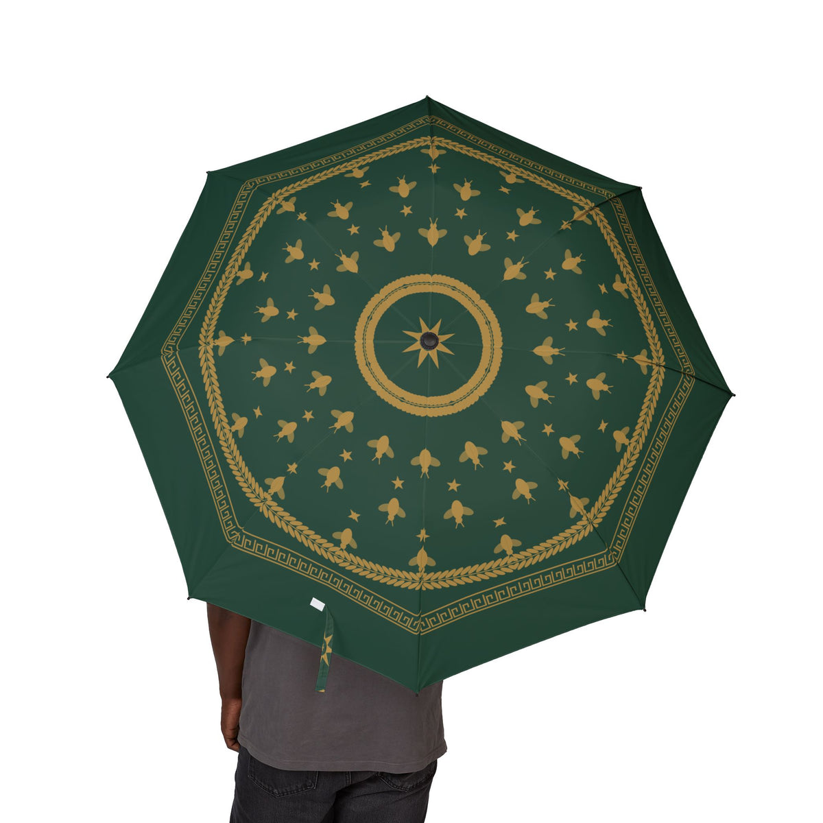 Person holding the Bonaparte Empire laurel folding umbrella, canopy from above
