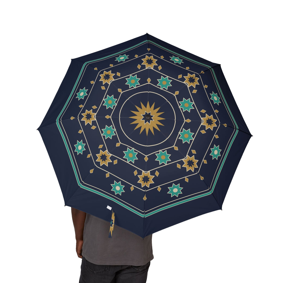 Person holding the Aldobrandini Moorish star folding umbrella, canopy from above