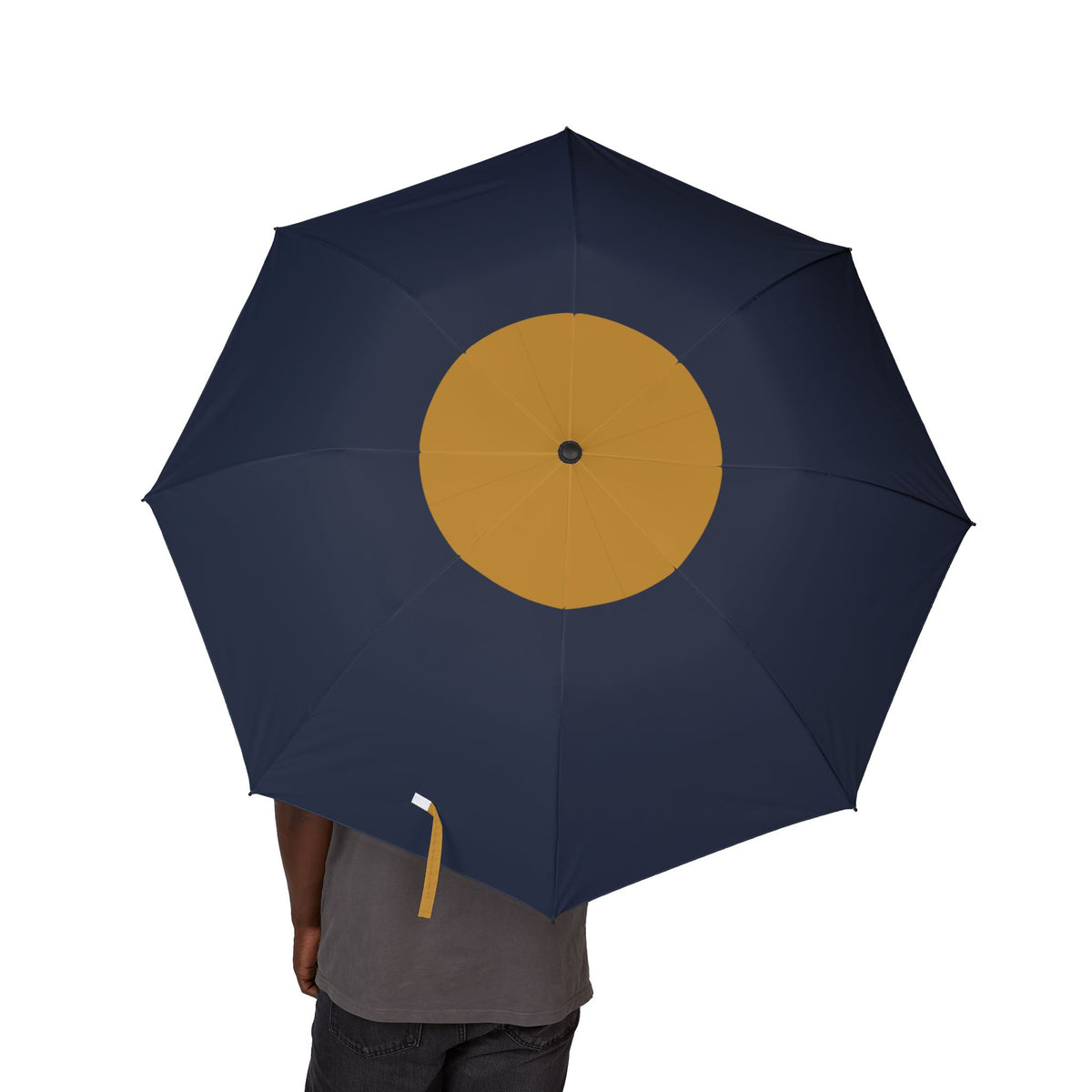 Person holding the Russell sun spot folding umbrella, canopy from above
