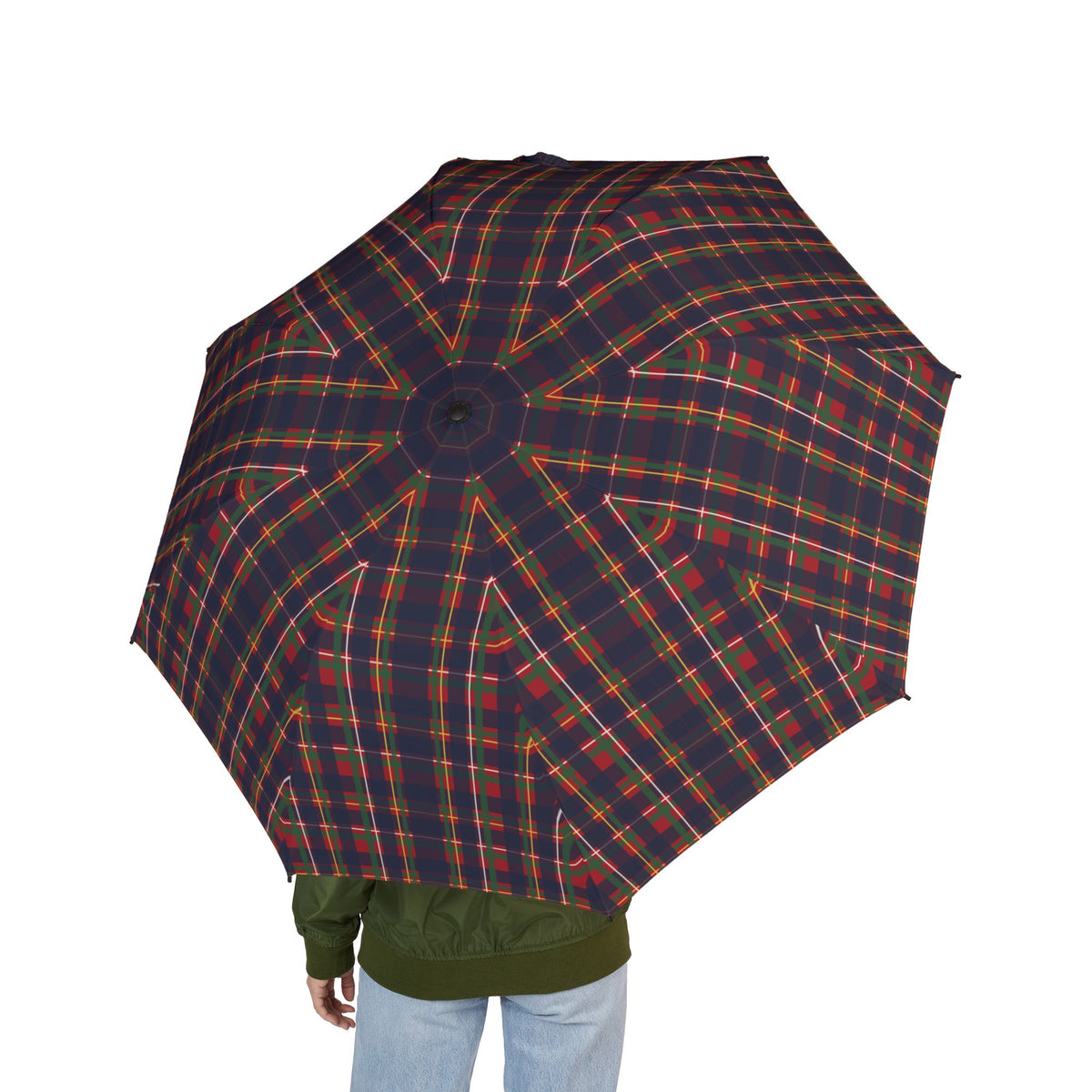 Person holding the Stuart royal tartan folding umbrella, seen from behind