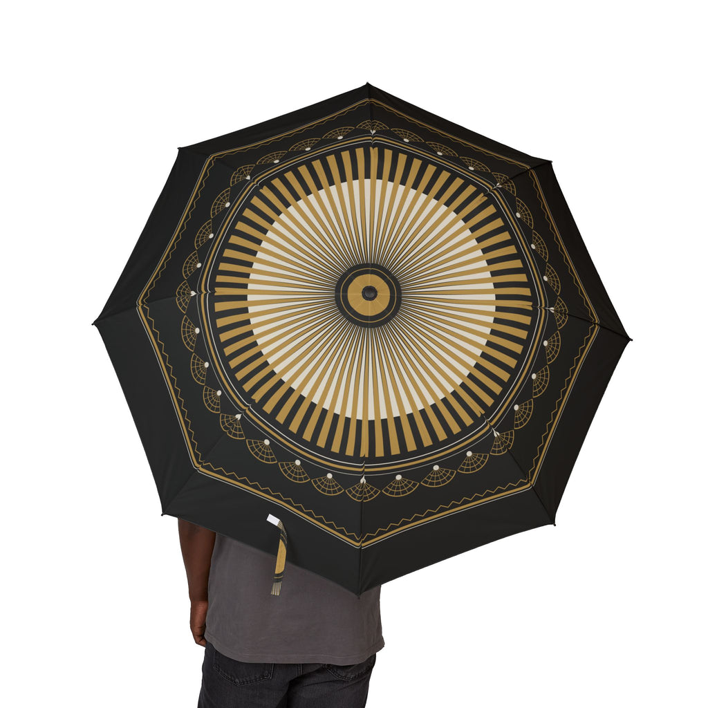 Person holding the Bourbon art deco sunburst folding umbrella, canopy from above