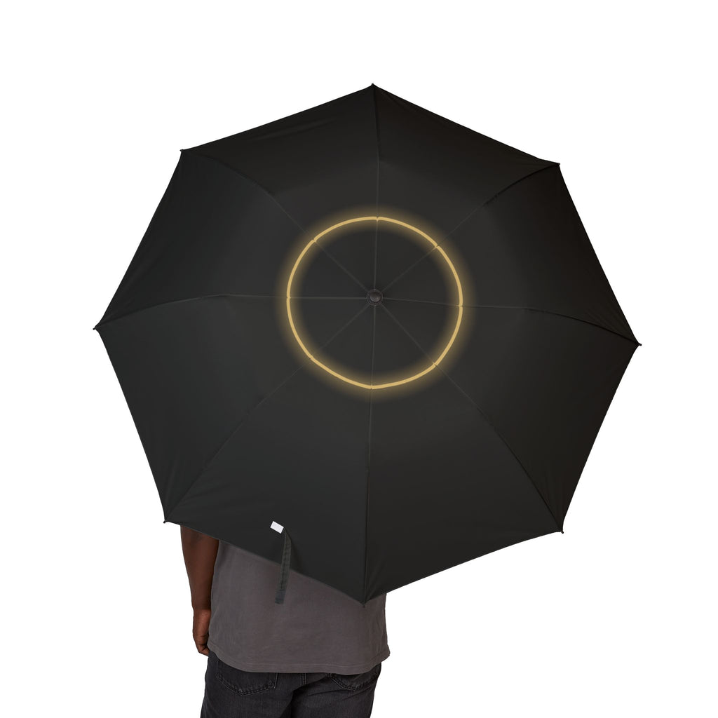 Person holding the Radziwiłł eclipse folding umbrella, canopy from above