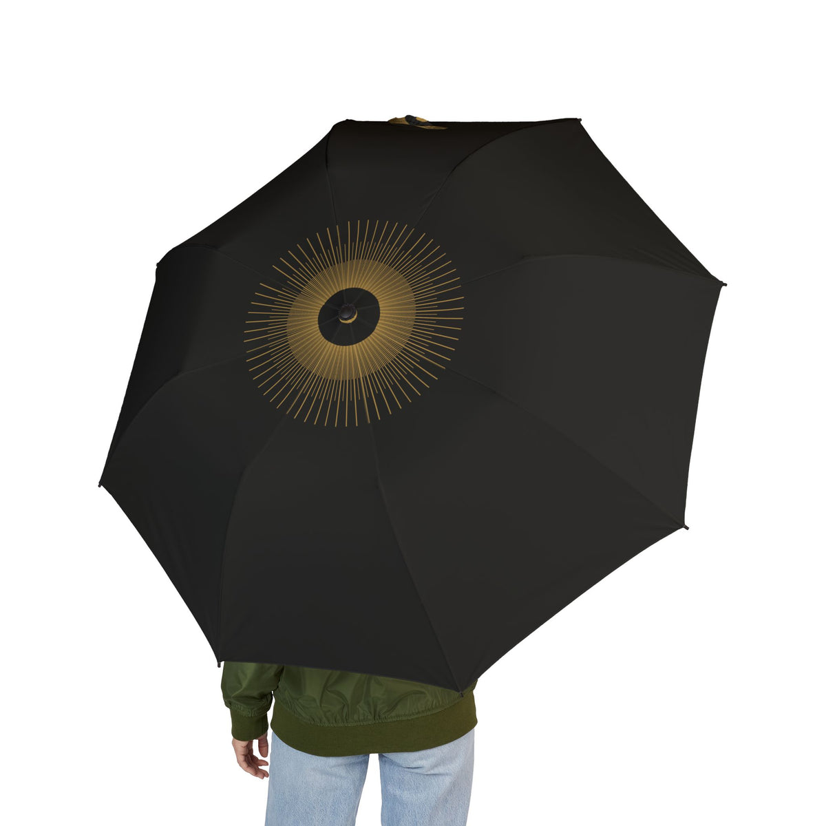 Person holding the Fitzroy starburst folding umbrella, seen from behind