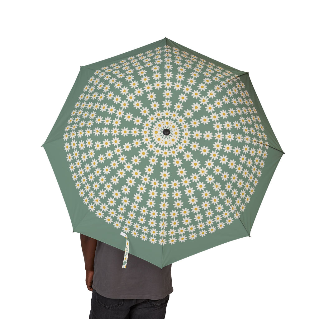 Person holding the Liechtenstein daisy field folding umbrella, canopy from above