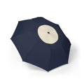 The Clifford cream crown folding umbrella, open, seen from above