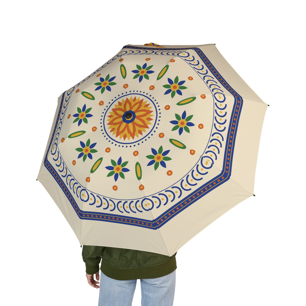Person holding the Trastámara Talavera tile folding umbrella, seen from behind