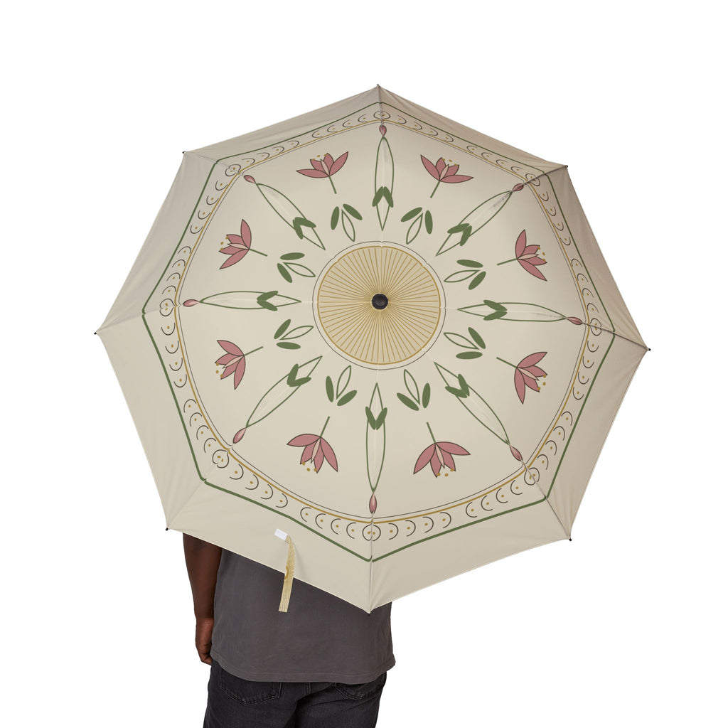 Person holding the Árpád Art Nouveau lily folding umbrella, canopy from above