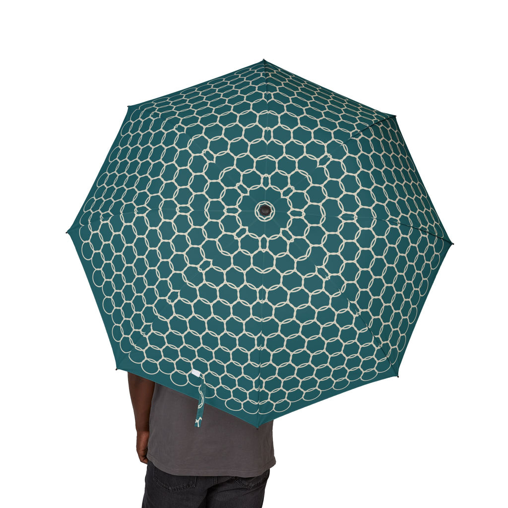 Person holding the Saadi Moroccan lattice folding umbrella, canopy from above