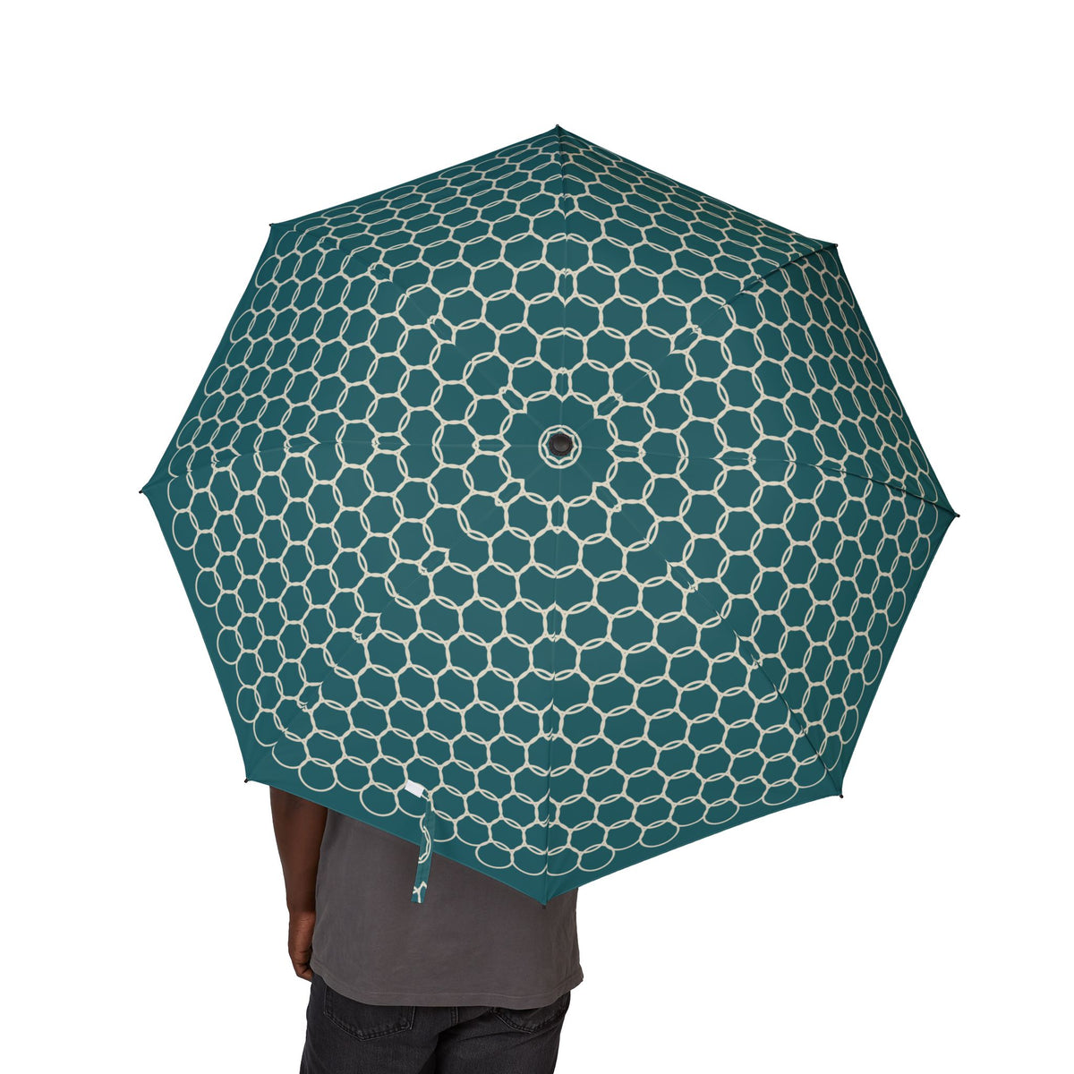 Person holding the Saadi Moroccan lattice folding umbrella, canopy from above