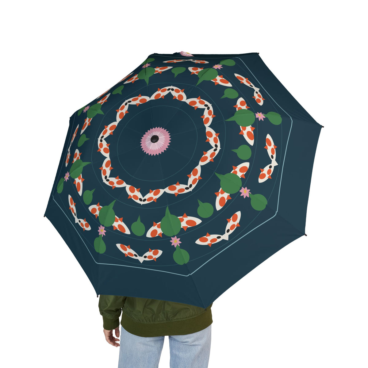Person holding the Holstein koi pond folding umbrella, seen from behind