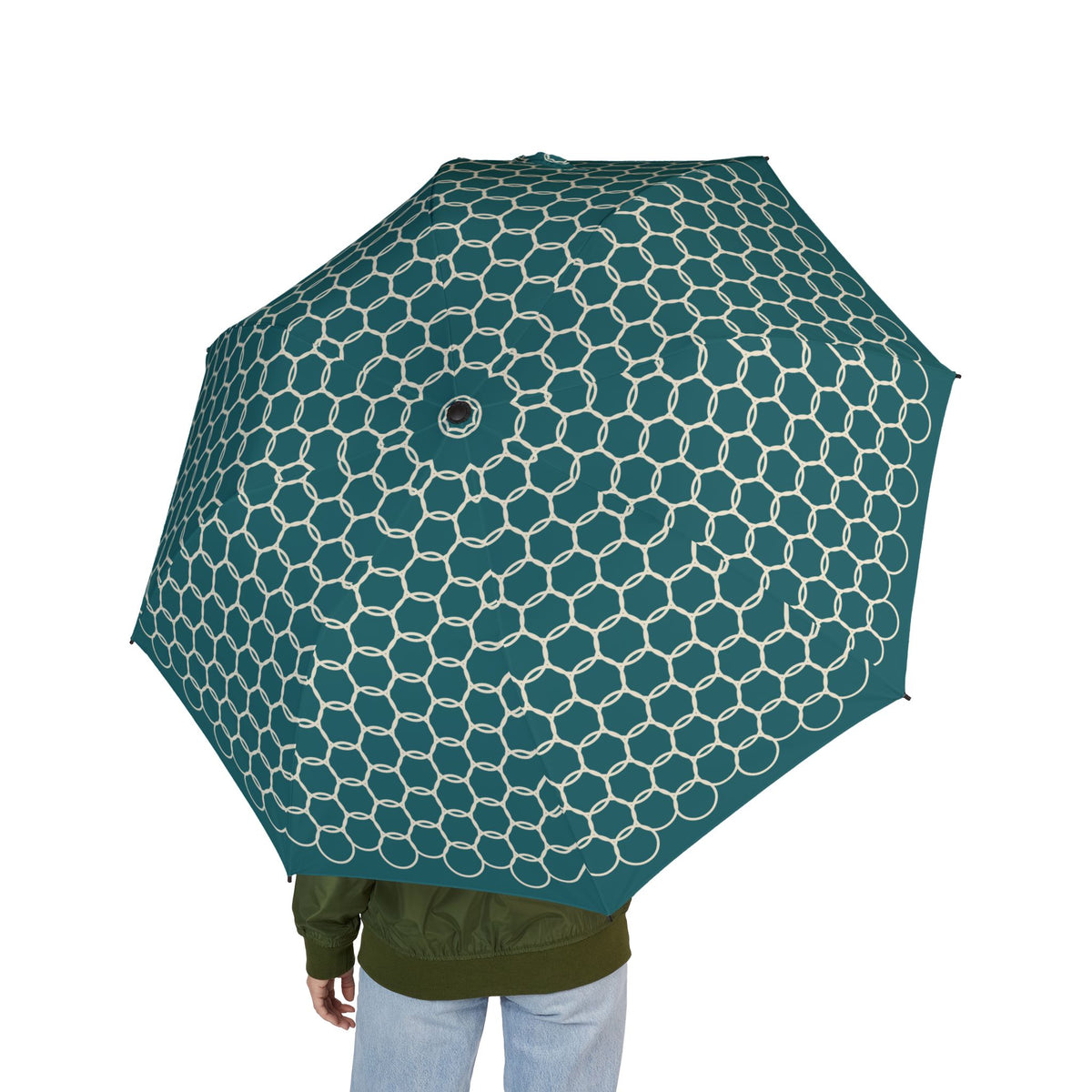 Person holding the Saadi Moroccan lattice folding umbrella, seen from behind