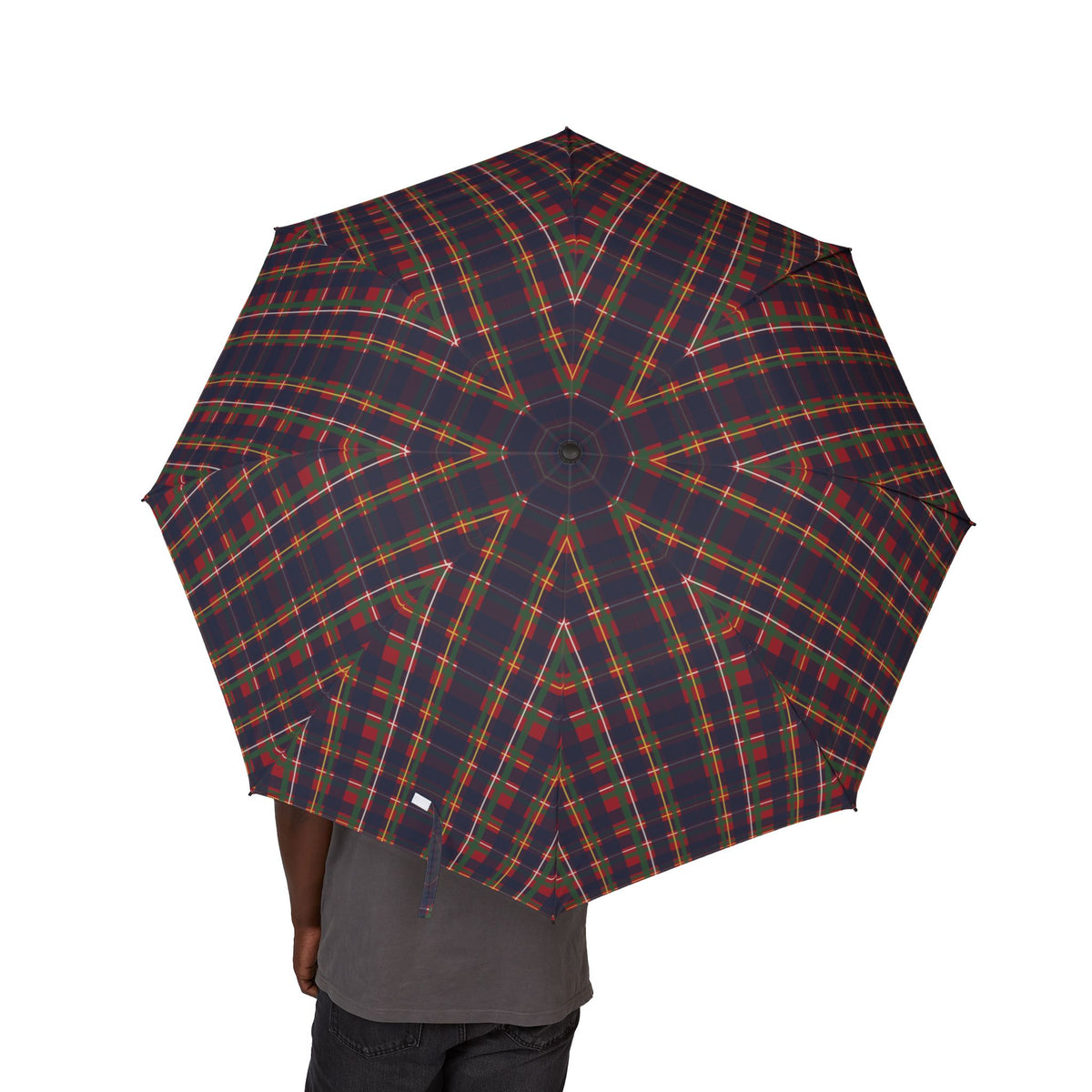 Person holding the Stuart royal tartan folding umbrella, canopy from above