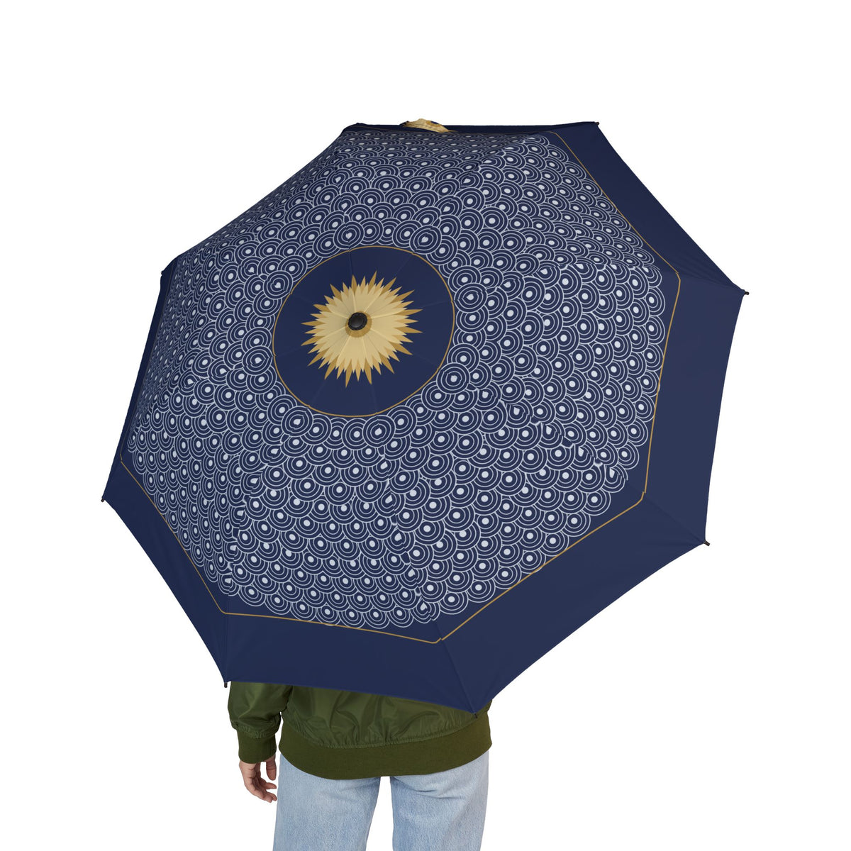 Person holding the Wittelsbach indigo wave folding umbrella, seen from behind
