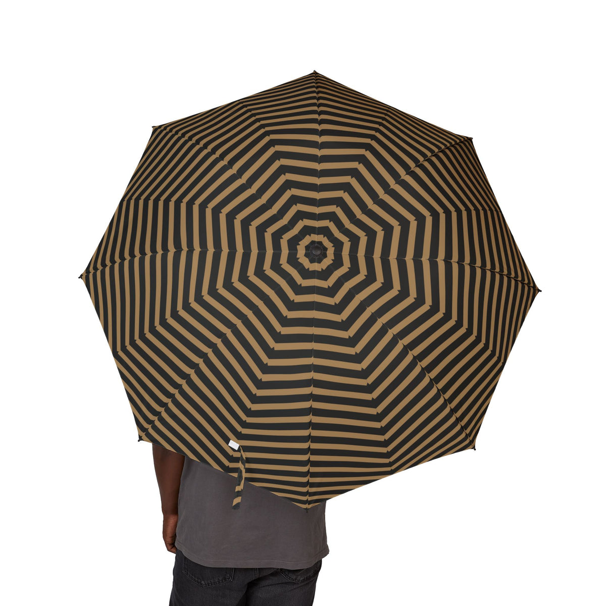 Person holding the Cavendish arrow chevron folding umbrella, canopy from above
