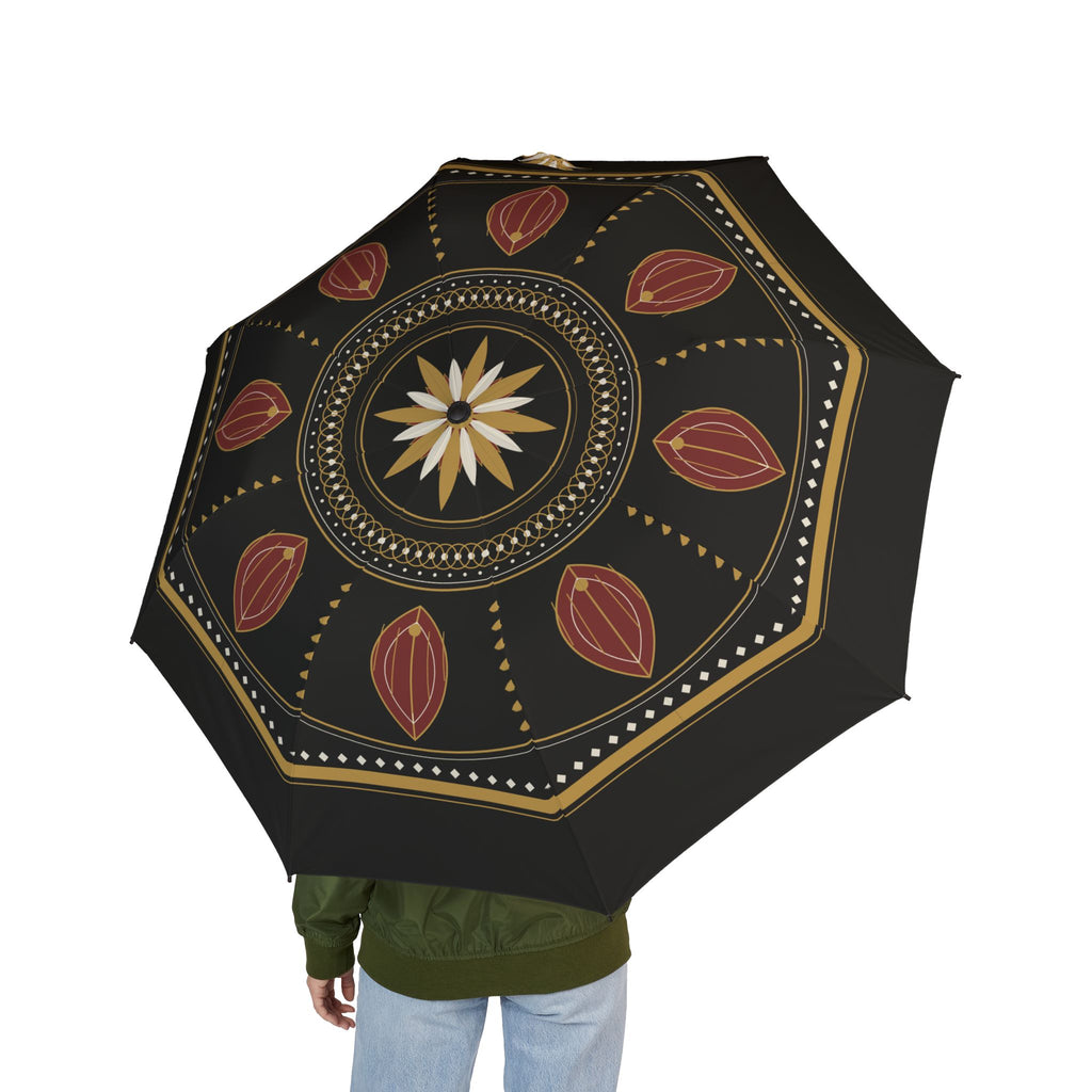 Person holding the Medici Florentine medallion folding umbrella, seen from behind
