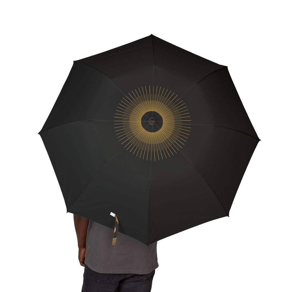 Person holding the Fitzroy starburst folding umbrella, canopy from above