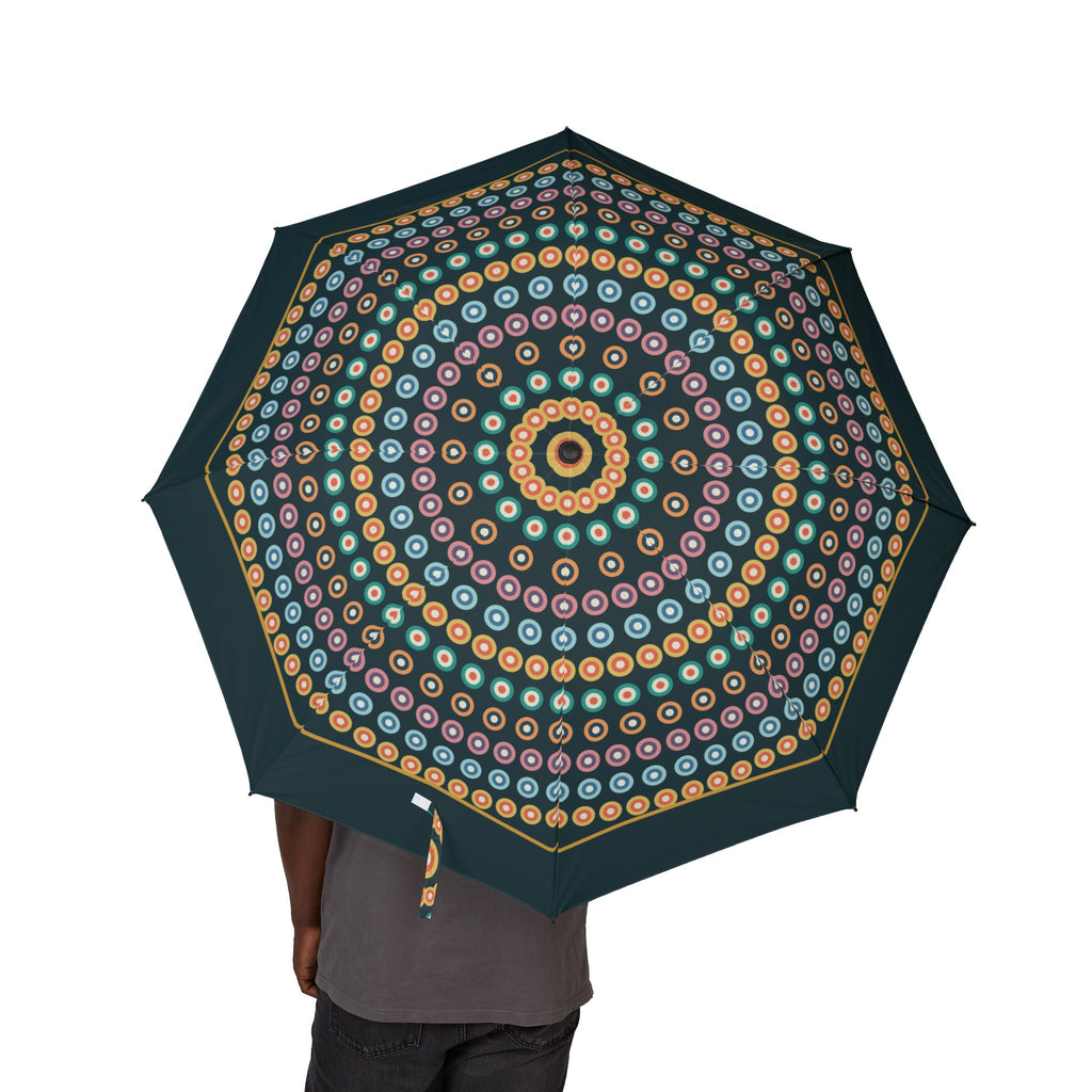 Person holding the Morosini Murano millefiori folding umbrella, canopy from above