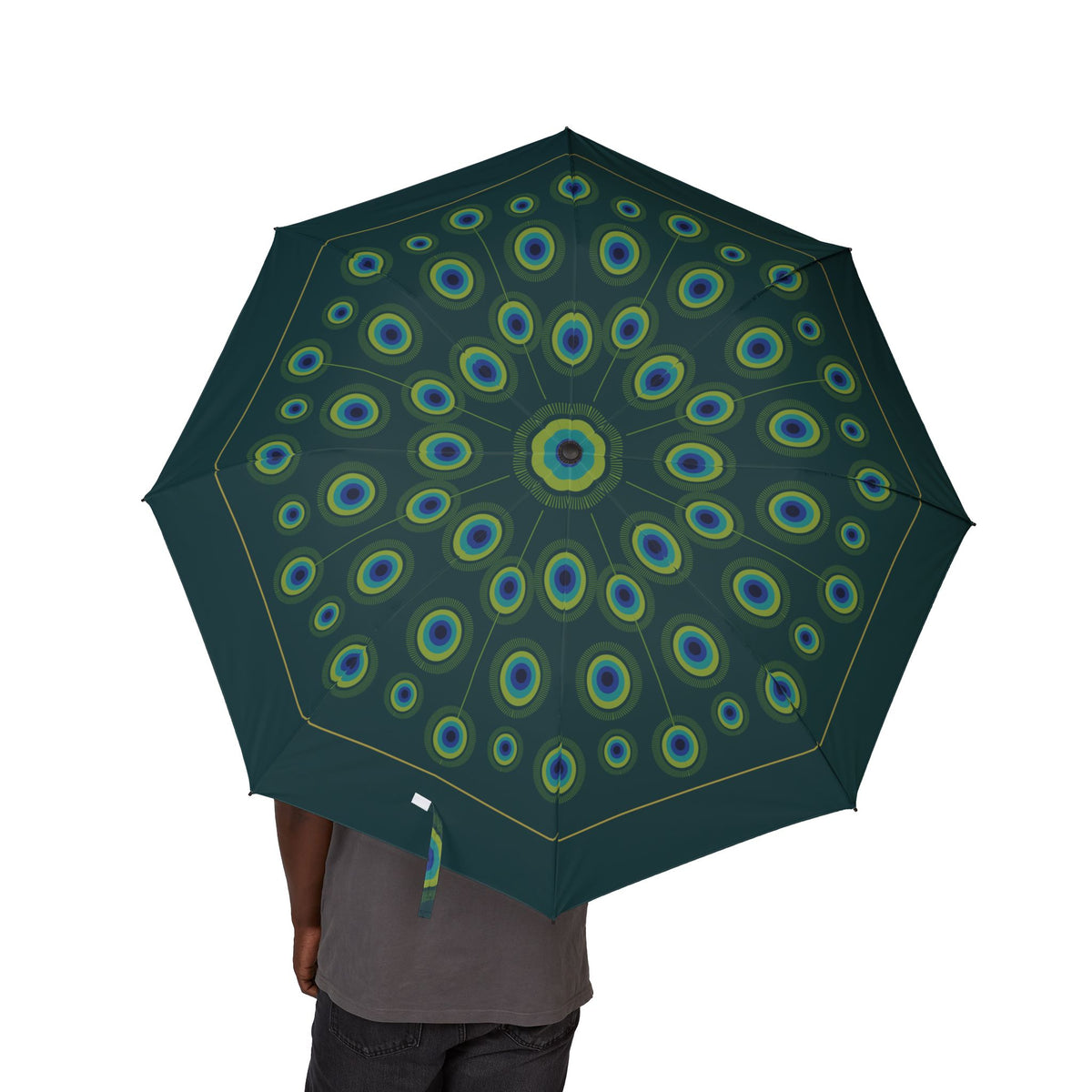 Person holding the Orléans peacock feather folding umbrella, canopy from above