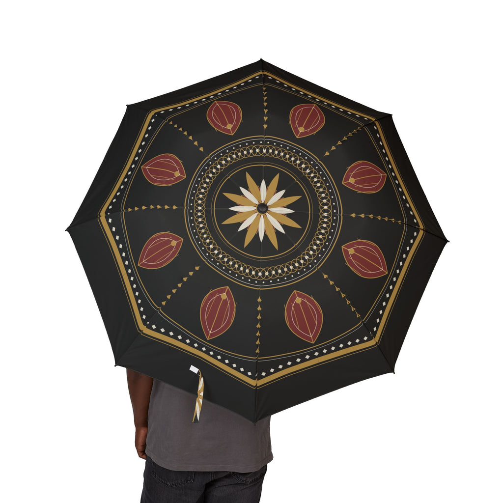 Person holding the Medici Florentine medallion folding umbrella, canopy from above