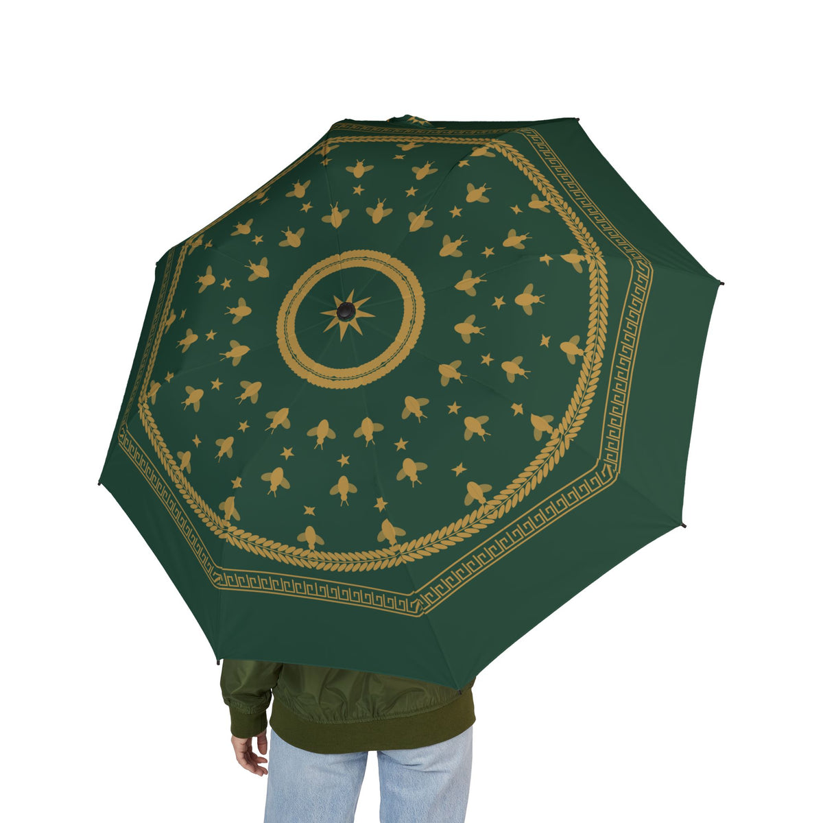 Person holding the Bonaparte Empire laurel folding umbrella, seen from behind