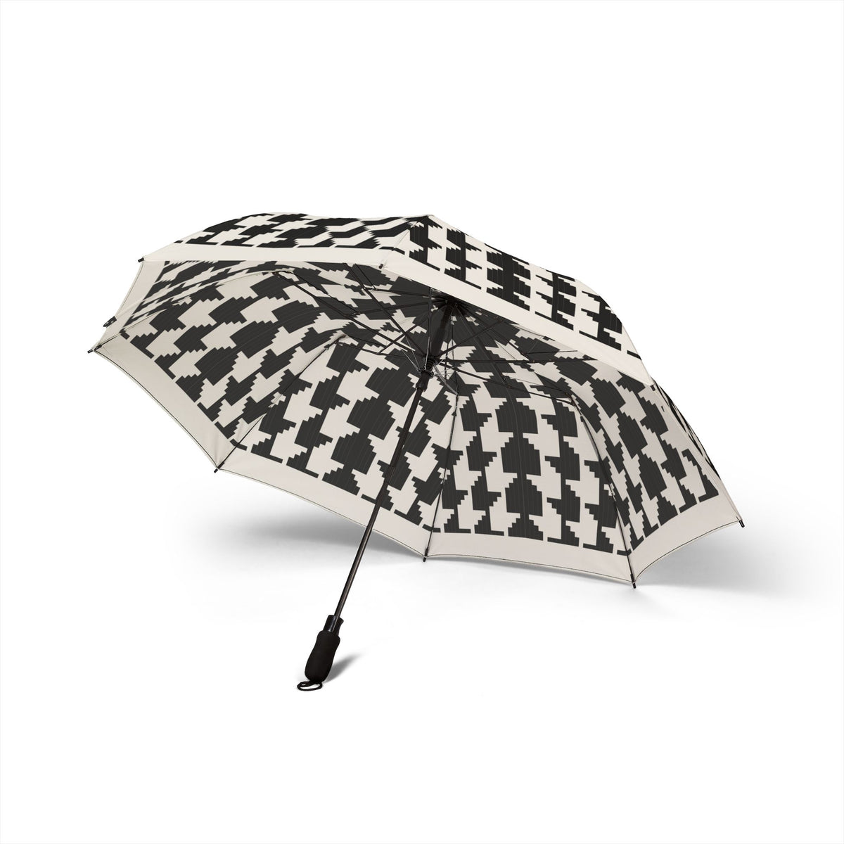 The Bernadotte houndstooth umbrella, underside with eight ribs