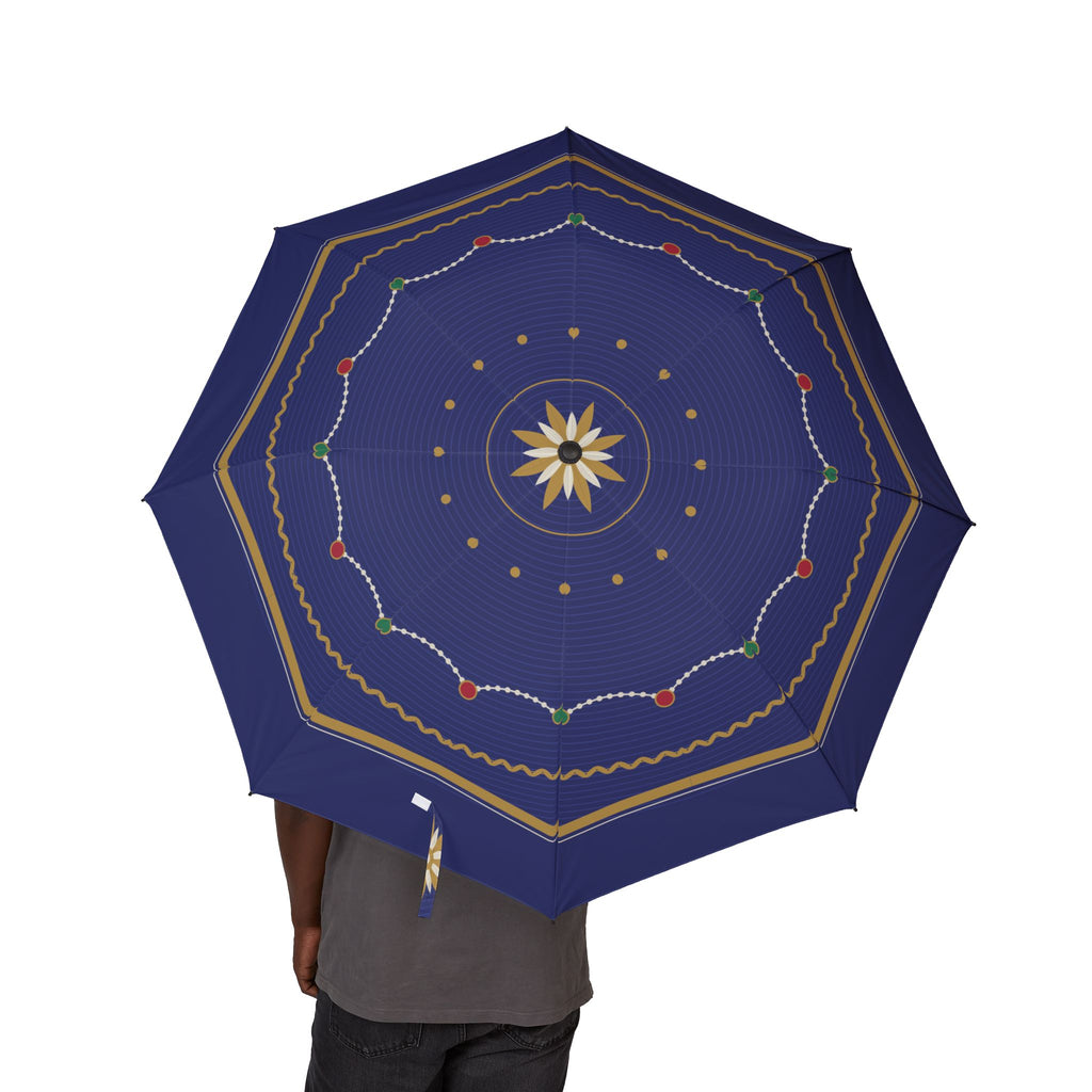 Person holding the Romanov imperial guilloché folding umbrella, canopy from above