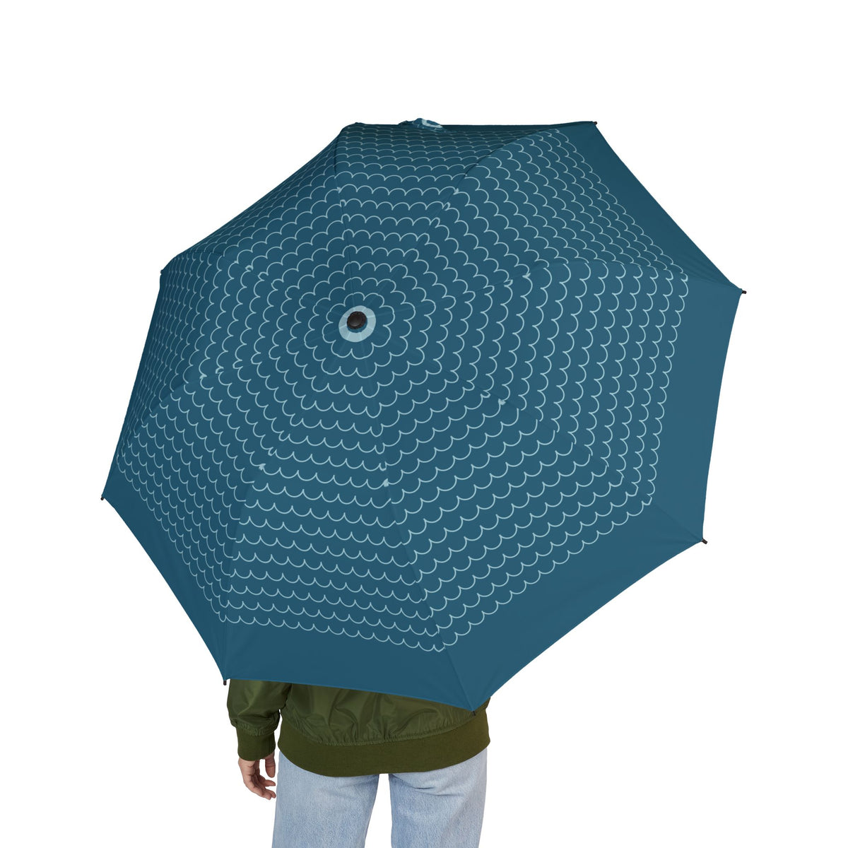 Person holding the Doria scallop folding umbrella, seen from behind