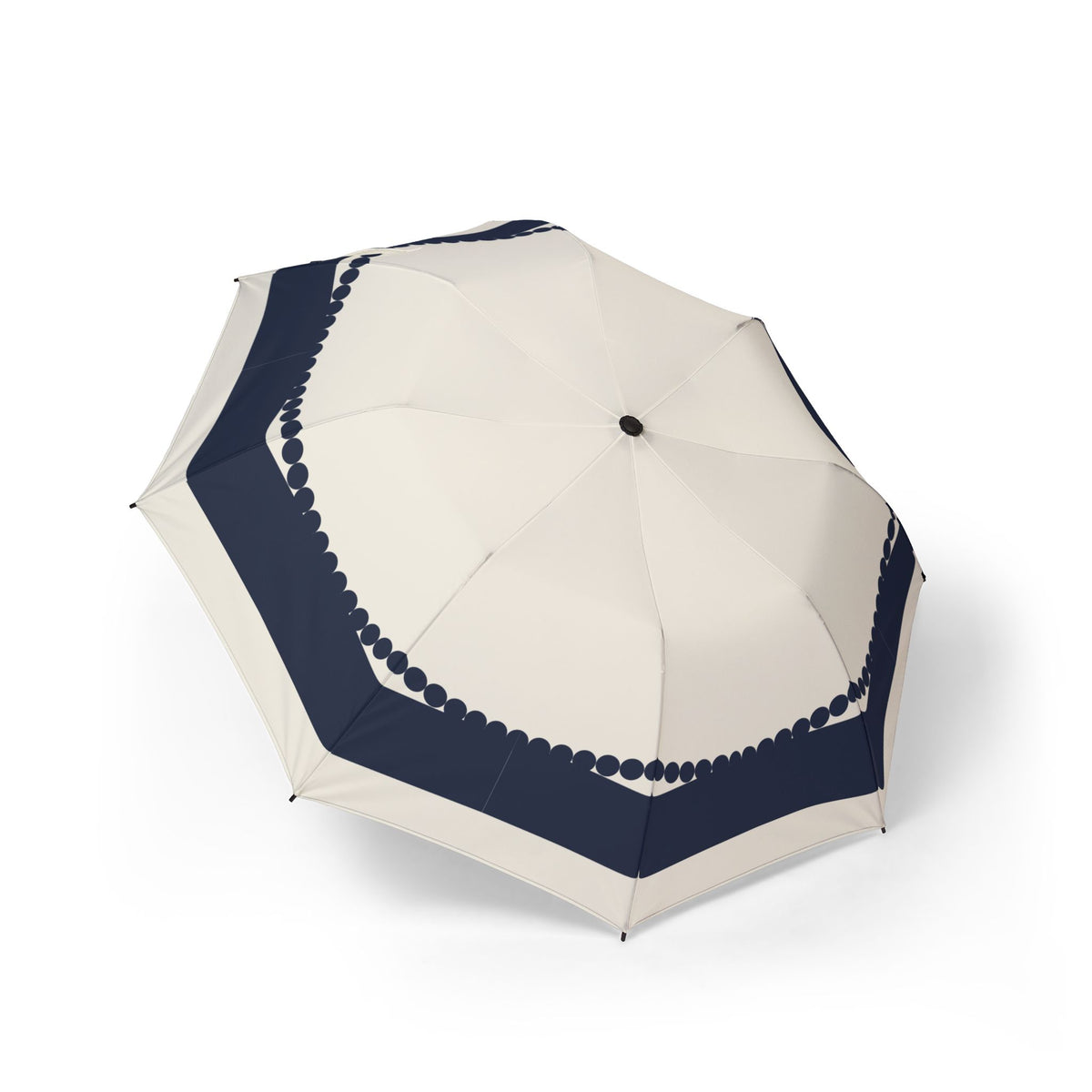 The Wyndham navy scallop folding umbrella, open, seen from above